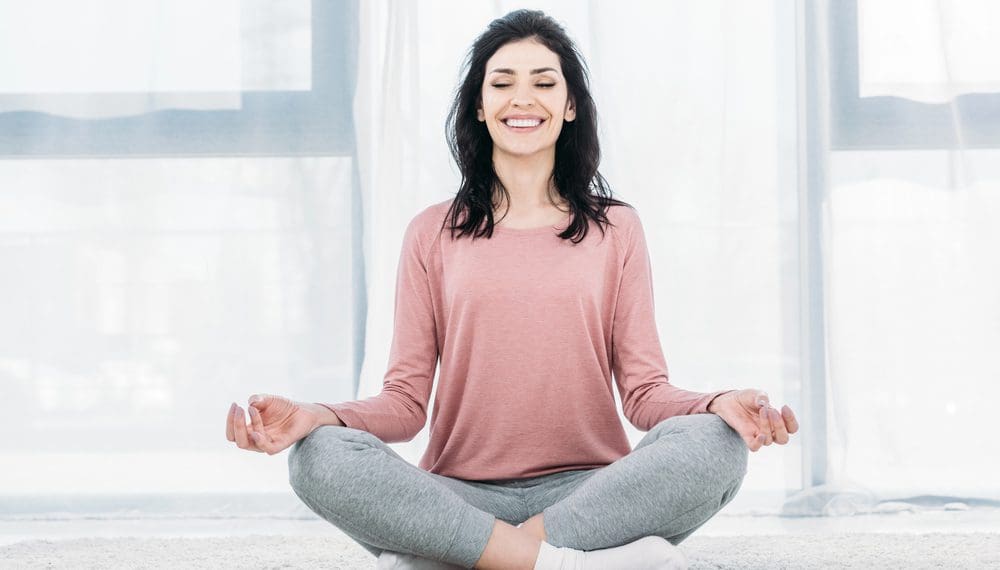 Woman meditating for anxiety relief