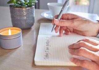 writing in a gratitude journal to improve mental health
