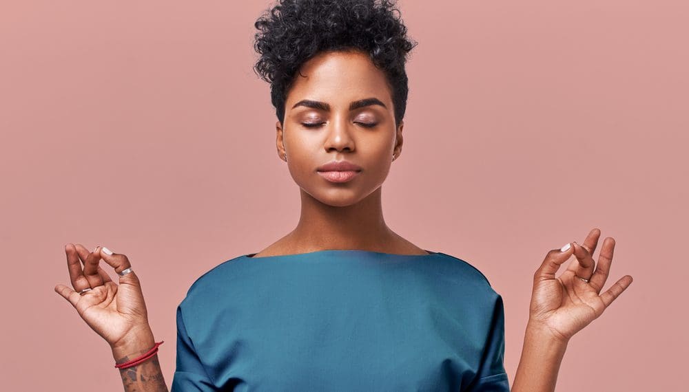 Calm woman relaxing meditating, no stress free relief at work concept, mindful peaceful young businesswoman or doctor practicing breathing yoga exercises on isolated over beige background