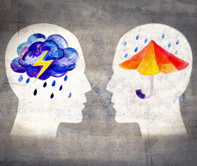 Illustration of two human profiles facing each other to feel feelings: one profile shows a stormy cloud with lightning and raindrops representing negative emotions, while the other profile has a bright umbrella shielding from the rain, symbolizing protection and emotional resilience.
