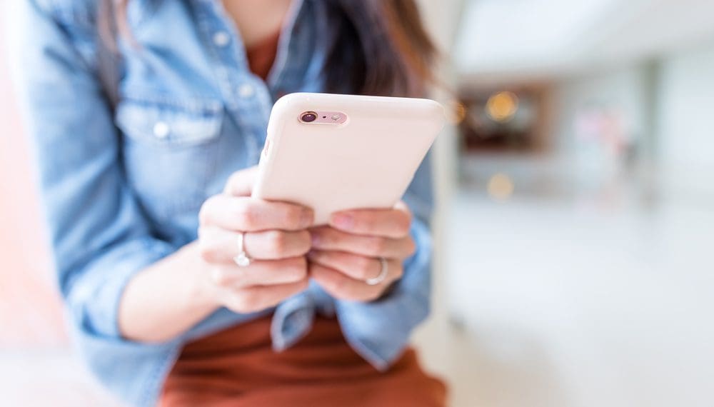 Young Woman use of cellphone and understanding the impacts of technology on mental health