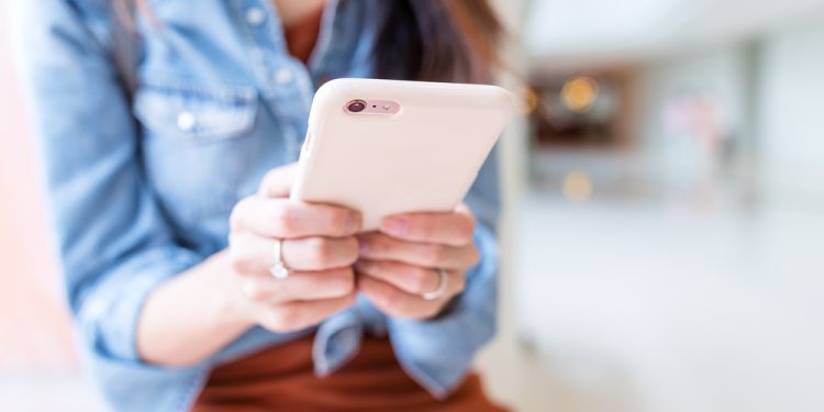 Young Woman use of cellphone and understanding the impacts of technology on mental health