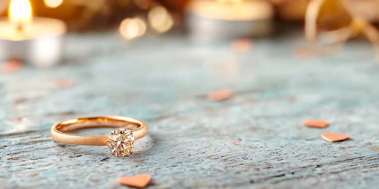 Elegant luxury engagement ring displayed in an exclusive jewelry boutique, showcasing timeless design and unmatched craftsmanship.