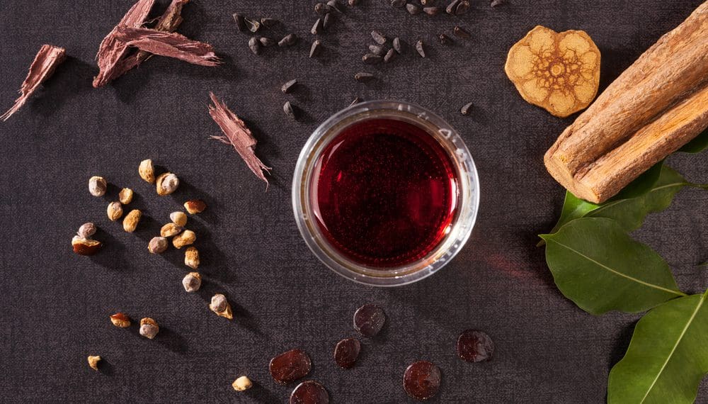 Ayahuasca brew in a traditional Amazonian setting, used for anxiety relief, emotional healing, spiritual growth, mental wellness, and holistic therapy.