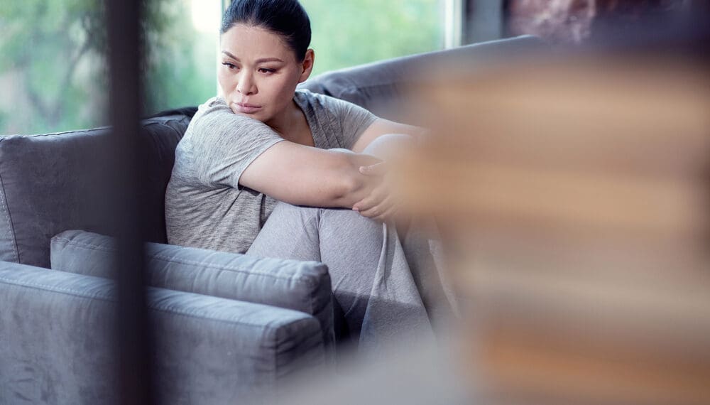 Teen girl in therapy for depression and substance use disorder, receiving holistic addiction therapy in New Jersey with support tools like fidget rings, anxiety jewelry, and mental health products.
