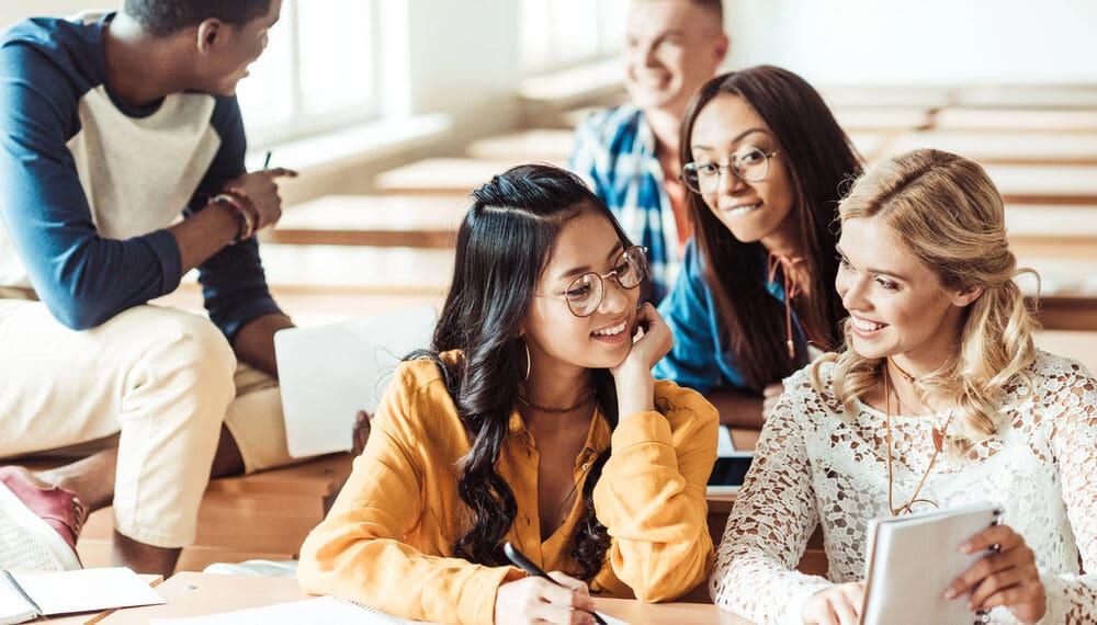 Diverse group of college students accessing mental health resources and support tools featured by Anxiety Gone, including self care items and anxiety relief products like fidget rings.